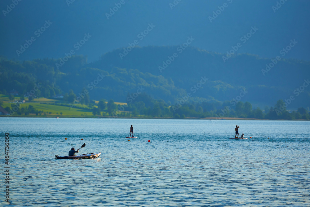 Fisherman on Lake Wolfgang. Austrian Alps, Salzburg region.