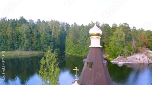 The Church of St. Andrew the First-Called on the Vuoksa River in St. Petersburg in Russia from a bird's-eye view 4k video