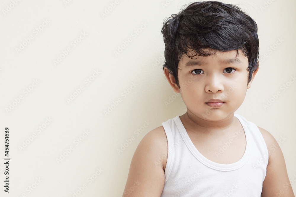 Cute Asian child little Thai boy 4 year old wearing a red sweater he have smile laugh face happy kid concept. Cute Asian child little Thai boy 4 year old wearing a red sweater he have smile laugh face happy kid concept.