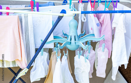 Round plastic hanger for drying small laundry.
