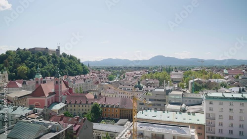 Wallpaper Mural Panorama panning over Ljubljana cityscape with castle and skyscraper monument 4K Torontodigital.ca