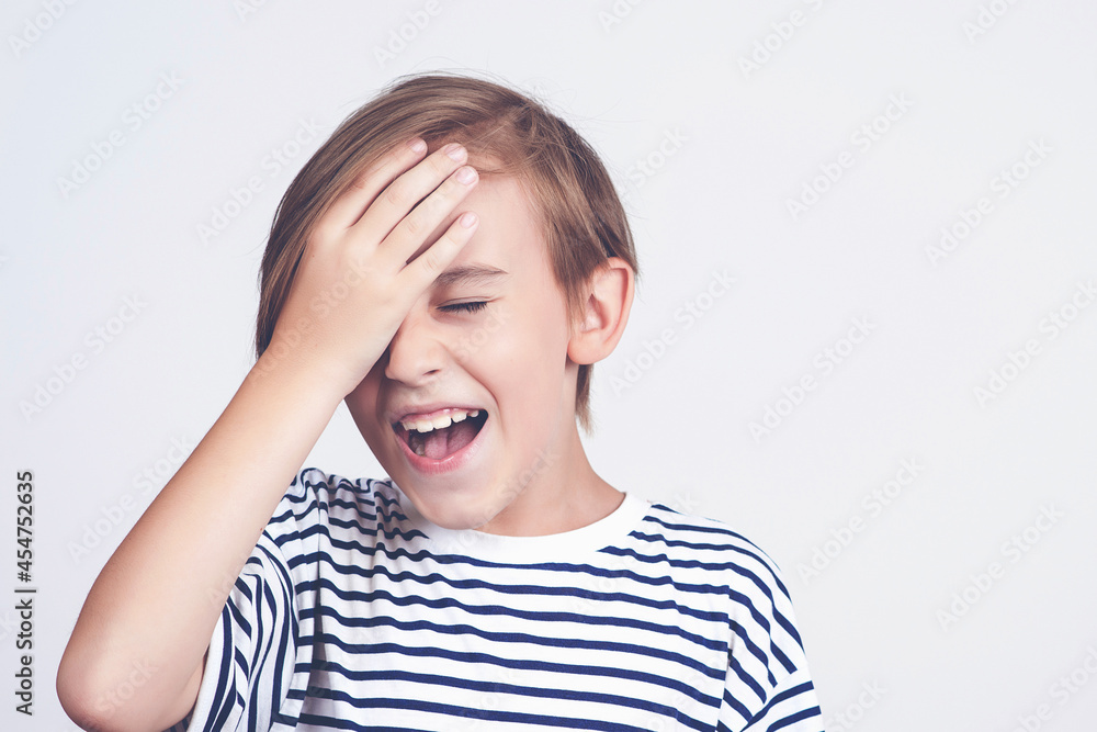Unhappy kid forgetting something. Face emotion and expression. Back to school and news. Oh no. Boy thinking about mistakes. Unhappy kid forgetting something. Face emotion and expression. Back to school and news. Oh no. Boy thinking about mistakes.