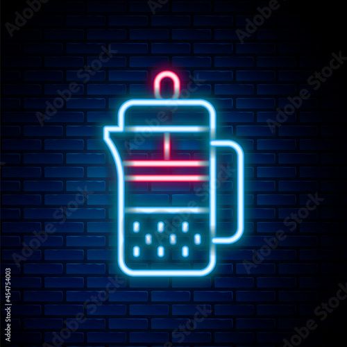 Glowing neon line French press icon isolated on brick wall background. Colorful outline concept. Vector
