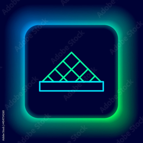 Glowing neon line Louvre glass pyramid icon isolated on black background. Louvre museum. Colorful outline concept. Vector