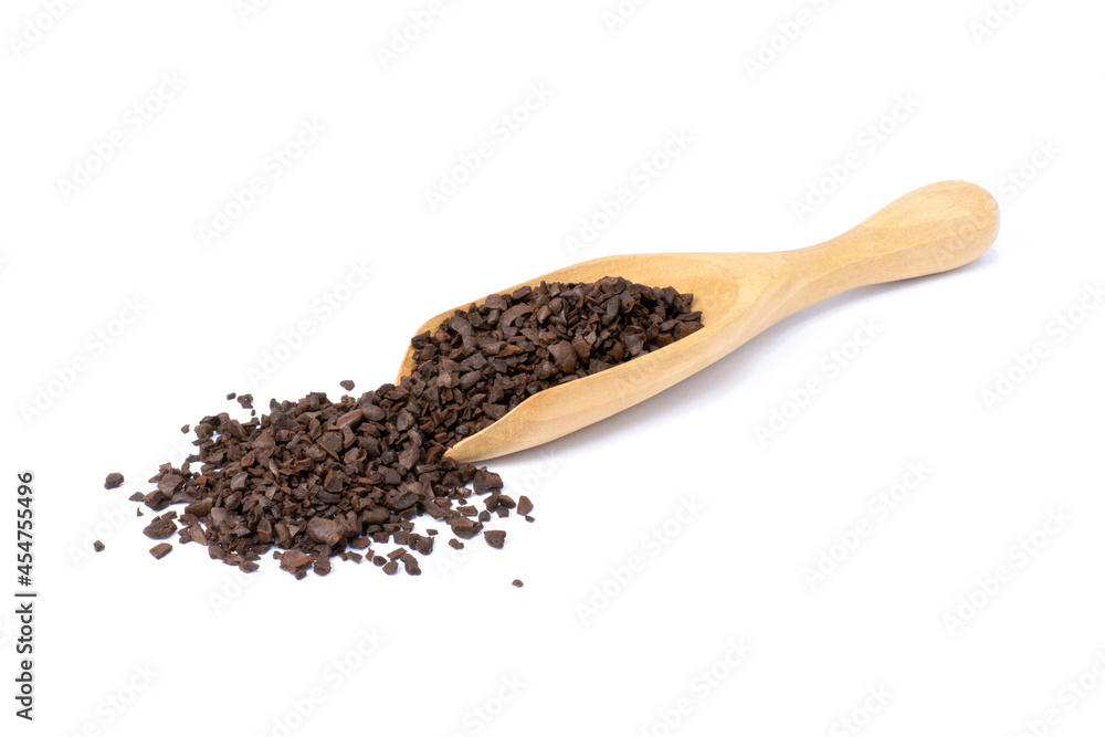 Instant coffee powder in wooden scoop isolated on white background. Instant coffee powder in wooden scoop isolated on white background.