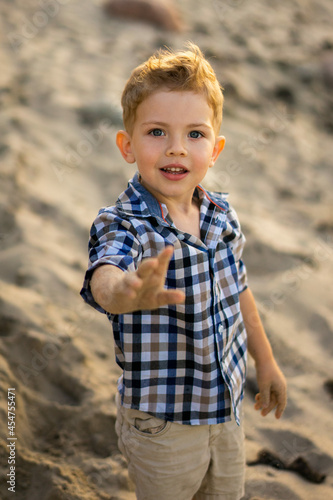 Close up portrait of toddler boy at the beach. summer vacation