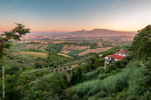Obraz na płótnie Beautiful sunset on the countryside of Marche in a summer evening w salonie