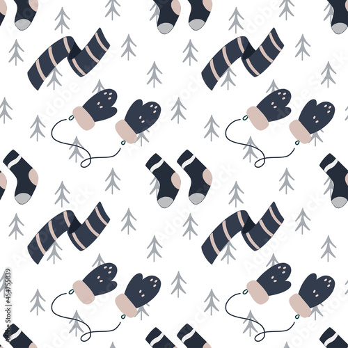 with knitted mittens, scarf and socks. Vector seamless pattern