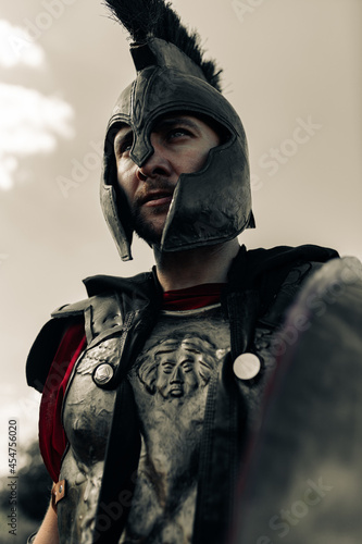 Portrait of Spartan warrior in armor and helmet. © Stanislav