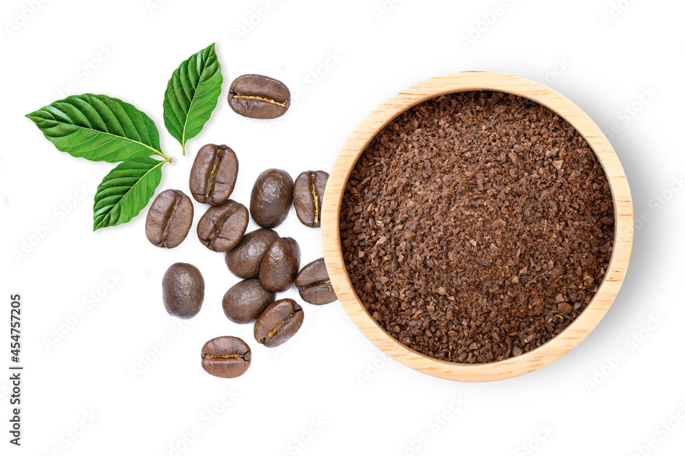 instant coffee in a spoon and coffee beans isolated on white. instant coffee in a spoon and coffee beans isolated on white.