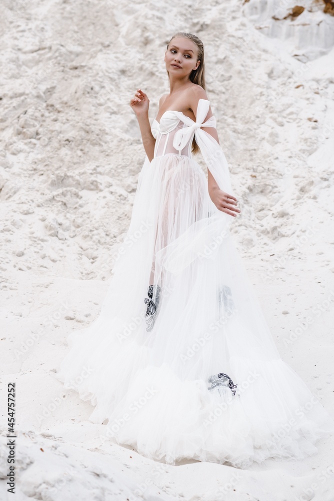 Beautiful wedding bride day outdoors at ocean beach. Happy marriage couple o Beautiful wedding bride day outdoors at ocean beach. Happy marriage couple o