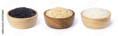 Schilderij op canvas Various type and color of rice ;  riceberry ,brown coarse rice and white thai jasmine rice in wooden bowl isolated on white background