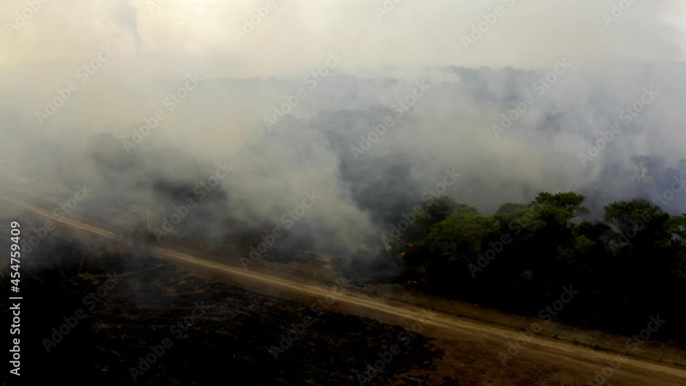 Pull back aerial view of fires engulfing the Brazilian Pantanal and destroying the forest Pull back aerial view of fires engulfing the Brazilian Pantanal and destroying the forest