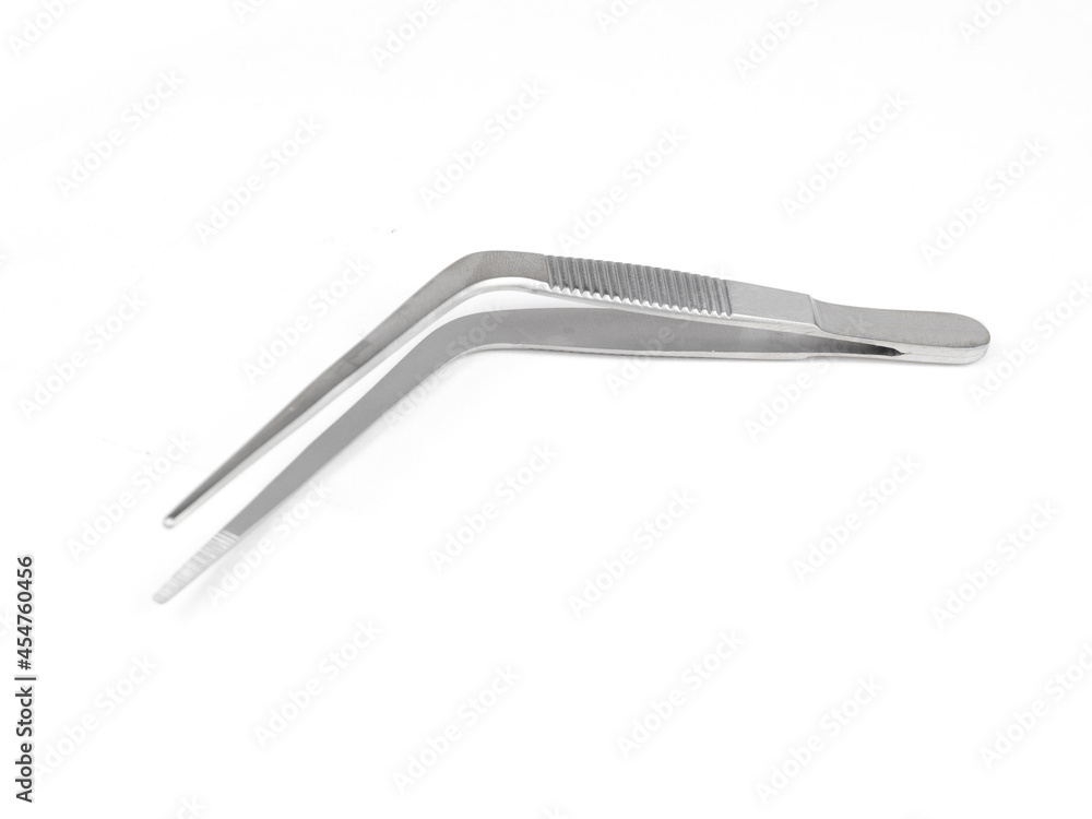 curved steel surgical tweezers with teeth on a white background curved steel surgical tweezers with teeth on a white background
