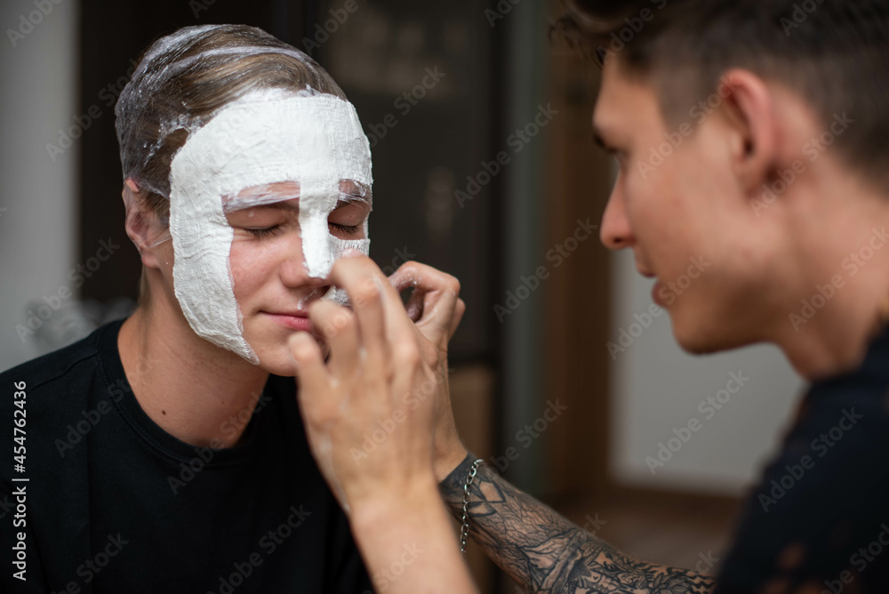 The process of making a plaster mask at home. creating masks based on a