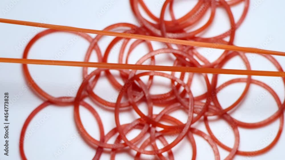red and sticky rubber band red and sticky rubber band