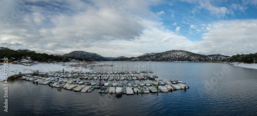 jetty with snowy mountains