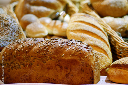 Closeup of loaf of bread with sunflower seeds, Homemade bread. Fresh baked bread in baker shop.