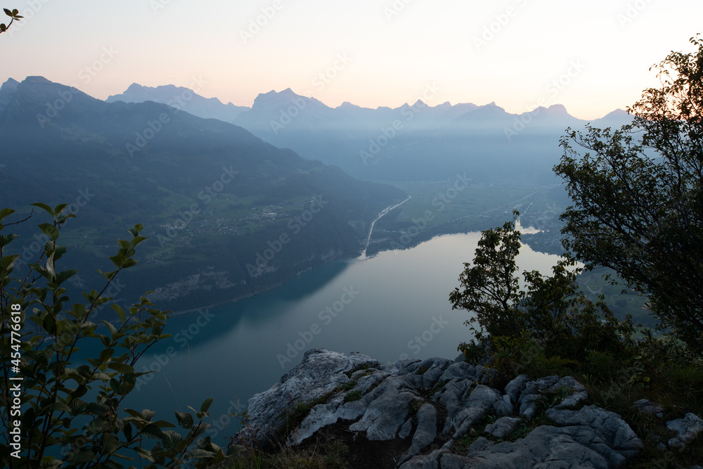 Amazing view over Lake Walen in the Canton Glarus, Switzerland. Wonderful sunset and sunrise in the swiss alps. This is a great place to hike and enjoy the beautiful nature in Switzerland. Amazing view over Lake Walen in the Canton Glarus, Switzerland. Wonderful sunset and sunrise in the swiss alps. This is a great place to hike and enjoy the beautiful nature in Switzerland.