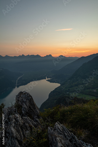 Amazing view over Lake Walen in the Canton Glarus, Switzerland. Wonderful sunset and sunrise in the swiss alps. This is a great place to hike and enjoy the beautiful nature in Switzerland. © Philip