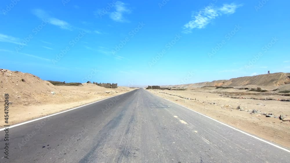 Drivers view on road in a desert in Peru (POV Video footage) Drivers view on road in a desert in Peru (POV Video footage)