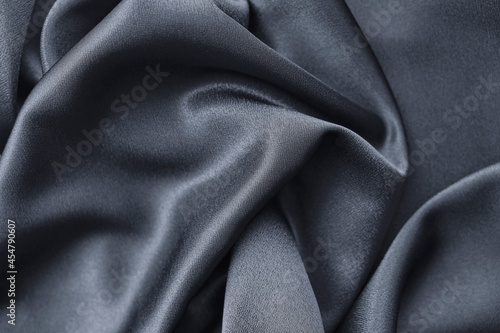 abstract texture of draped Gray background. eautiful textile backdrop. Close-up. Top view