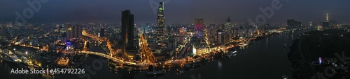 Aerial panoramic view of downtown Saigon (Ho Chi Minh) city skyline at night