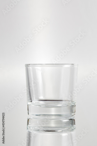 shot glass on gray background