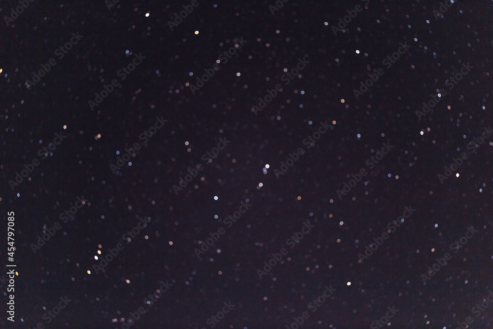 Fototapeta premium Blue dark night sky with many stars. Milky way cosmos background. The stars in the night sky. Starry blue night sky. Night scape with beautiful starry sky. Star texture. Space background