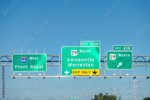 Gainesville, Virginia interstate highway i-66 in Virginia driving point of view in Washington DC metro area to Front Royal overhead sign