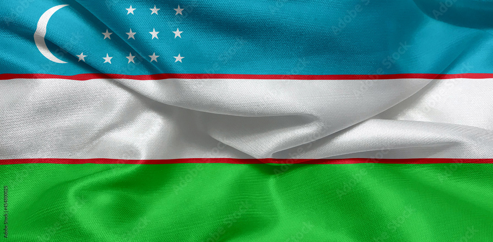 Obraz premium waving uzbekistan flag