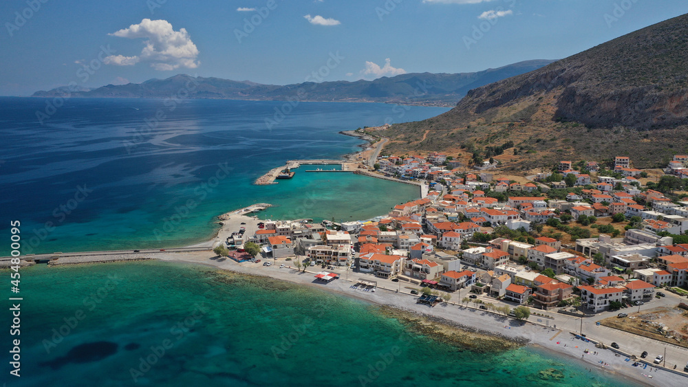 Fototapeta premium Aerial drone photo of new city of Monemvasia in the heart of Lakonia with beautiful clouds and deep blue sky, Peloponnese, Greece