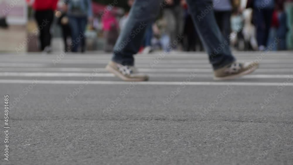 Crowd of pedestrians on the crosswalk at the busy urban street Crowd of pedestrians on the crosswalk at the busy urban street