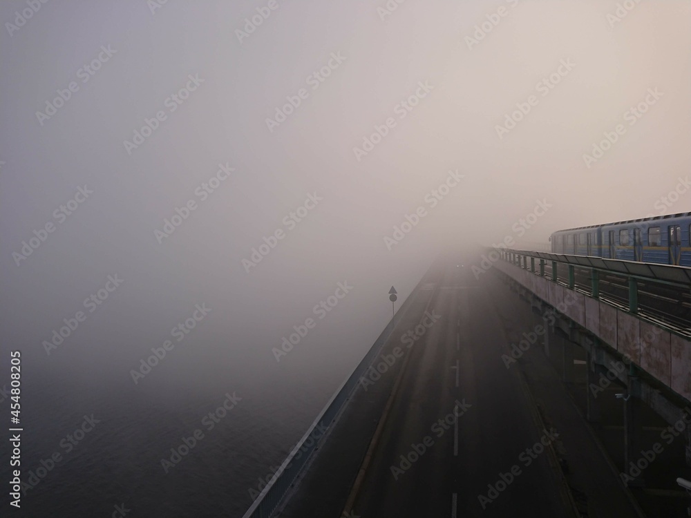 railway bridge in fog