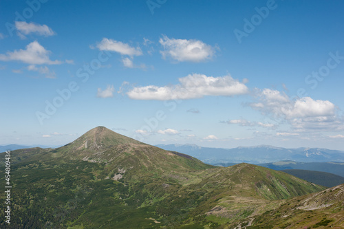 panorama of mountain ranges and cloudy sky background
