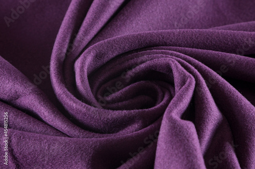 rolled into a spiral warm coat fabric with a purple pile