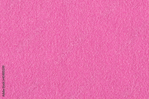 smooth warm coat fabric with a pile of pink color, background, texture