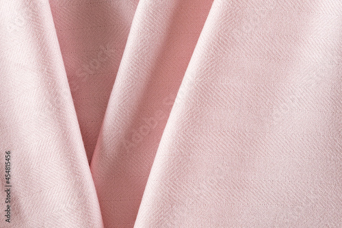 beautifully folded pink cashmere fabric