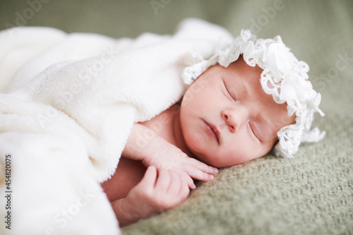 Closeup portrait of a sleeping newborn baby.