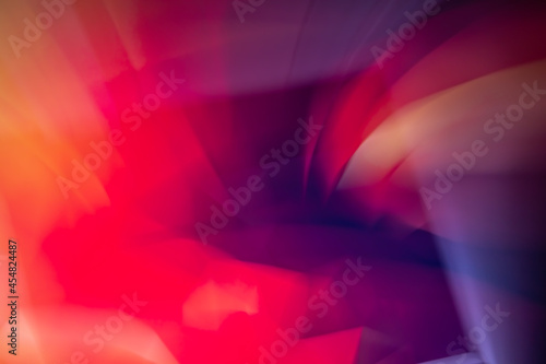 Multicolor abstract background with a slight blur in burgundy, red tones.