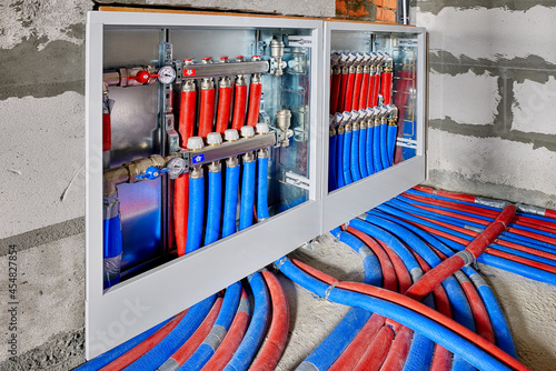 Billede på lærred Heating system manifold valves for heat flooring and water supply in a country house
