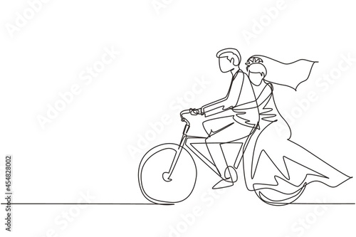 Single one line drawing romantic married couple. Man wearing suit and woman with wedding dress are riding bicycle together. Intimacy celebrates wedding day. Continuous line draw design graphic vector