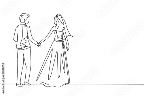 Single one line drawing romantic married couple in love hand in hand. Man wearing suit and woman with wedding dress in love spending time together at park. Continuous line draw design graphic vector