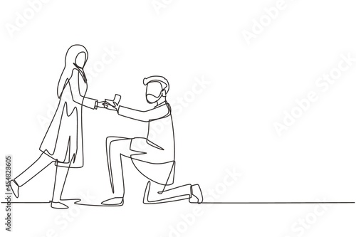 Single one line drawing Arab man kneeling offering engagement ring to his girlfriend. Young guy on knees proposing girl to marry. Marriage proposal concept. Continuous line draw design graphic vector