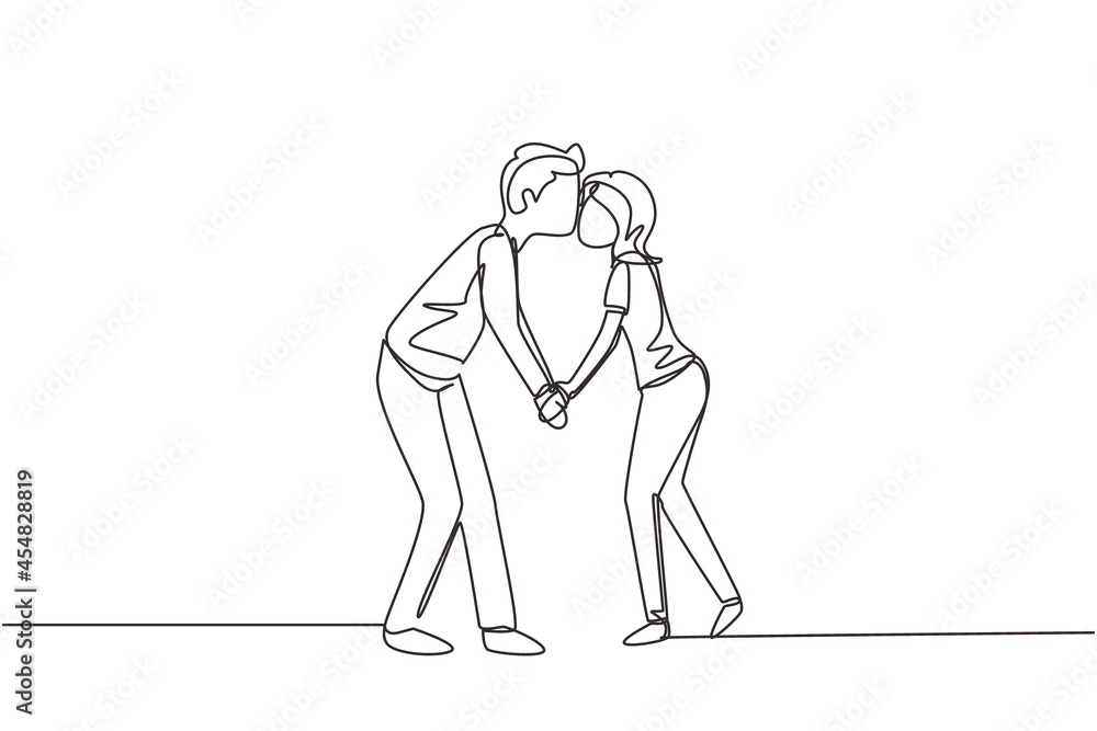 Single continuous line drawing romantic of male and female couple with lips locked in kiss. Happy cute couple lovers kissing and holding hands. Dynamic one line draw graphic design vector illustration Single continuous line drawing romantic of male and female couple with lips locked in kiss. Happy cute couple lovers kissing and holding hands. Dynamic one line draw graphic design vector illustration