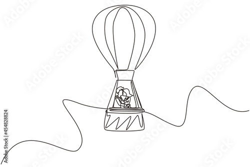 Single one line drawing funny illustration of love kissing couple in hot-air balloon in sky and clouds, amorous relationship. Romantic road trip, journey. Modern continuous line draw design graphic