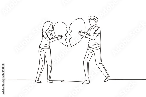 Single one line drawing heartbroken couple parting, divorce. Sad young man and woman trying to put together parts of broken heart. Modern continuous line draw design graphic vector illustration