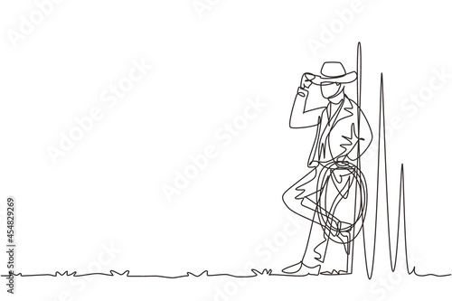 Single one line drawing western relaxing man with cowboy hat and lasso. American cowboy lifestyle at livestock horse in the evening. Modern continuous line draw design graphic vector illustration