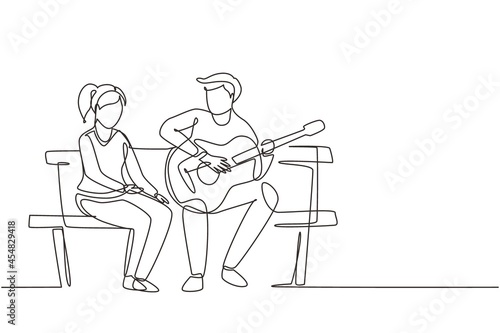 Single continuous line drawing people sitting on wooden bench in park. Couple on date, man playing music on guitar, girl listen and singing together. One line draw graphic design vector illustration