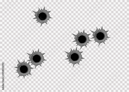 Fotografie Realistic bullet holes from firearm in metal plate.